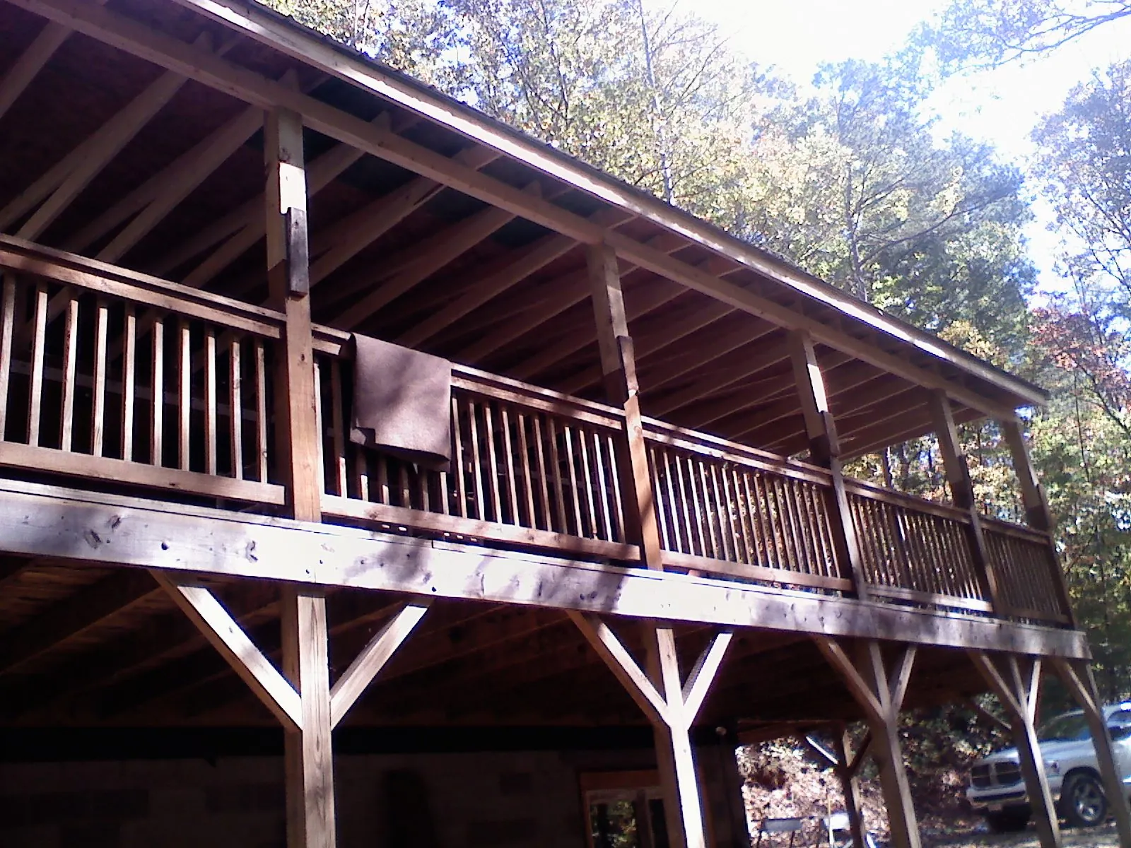 Timber framing under a new elevated porch and deck — Roof Leak Repair in Kingsbury by Roofing Brothers